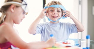 Elephant crafts, like paper face masks, are a fun activity for kids.