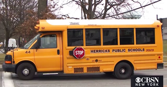 A yellow school bus from Herricks Public School