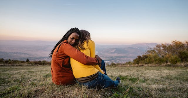 Two friends hugging each other