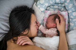 Mommy and baby bonding lying down