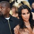 Former spouses Kim Kardashian and Kanye West posing together at the Met Gala 