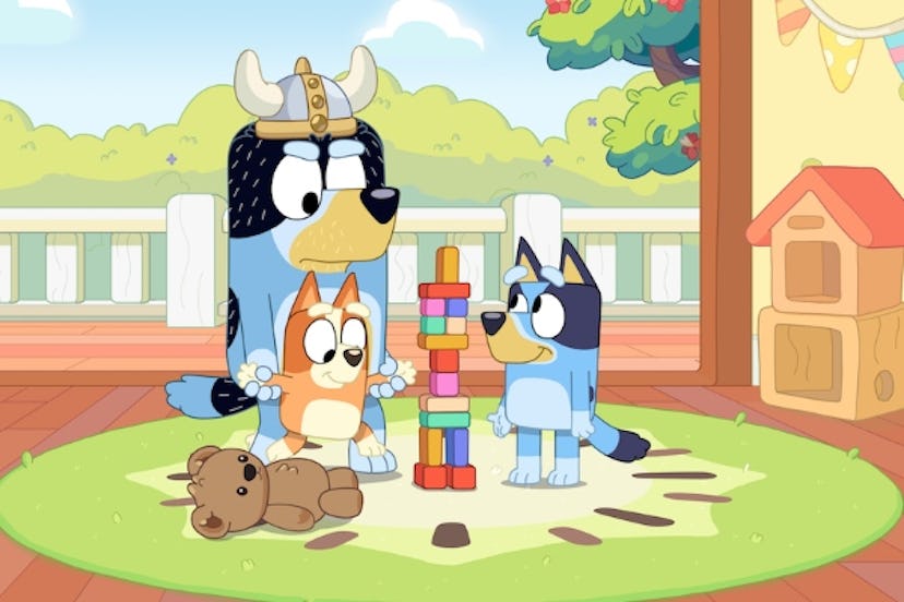 Bluey and her family playing with toys.
