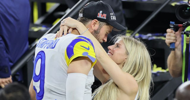 Matthew Stafford and his wife Kelly Hall hugging before the Superbowl