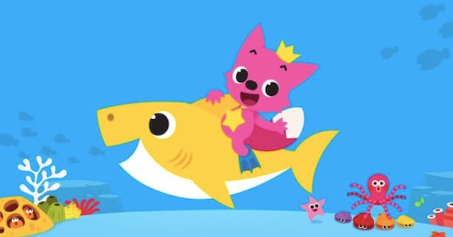 Illustration of a cat riding a shark under the sea announcing a full-length Baby Shark movie.