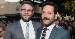 Seth Rogen hugging Paul Rudd for a photo at an event