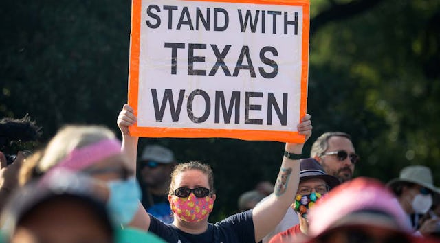 demonstrator in texas abortion ban pill orders go up