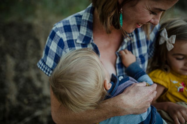 mom breastfeeding toddler