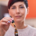 woman with CBD oil