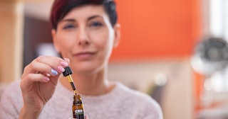 woman with CBD oil