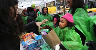 Girl Scouts selling cookies