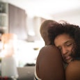 Mother and daughter embracing after mental health conversation