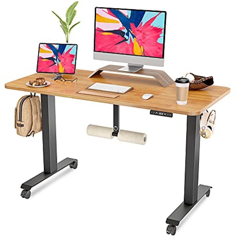 FAMISKY Adjustable Height Electric Standing Desk with Footrest (48-inch)