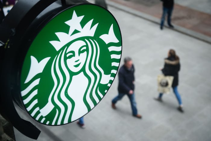 A Starbucks logo on the street