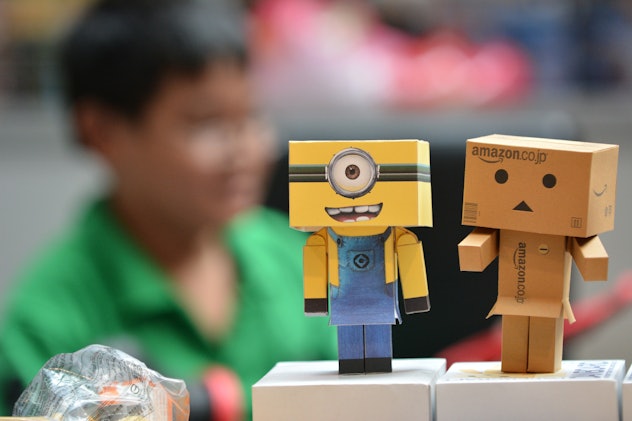 Toys in shape of minion and carton box 