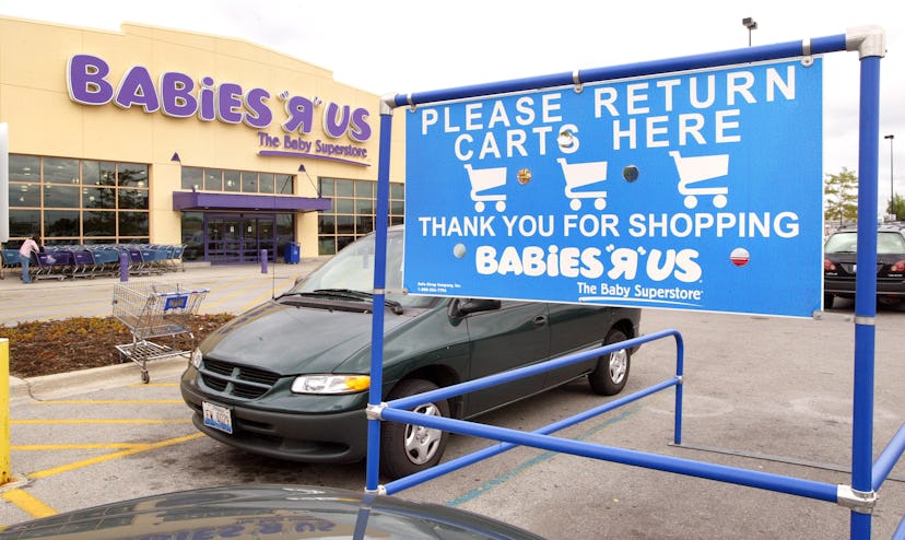 Babies "R" Us sign on the parking lot "please return carts here"