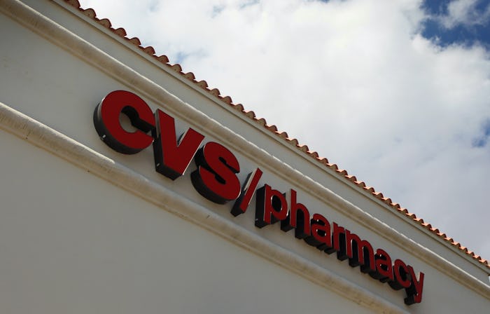 The front entrance to a CVS with the logo on the top