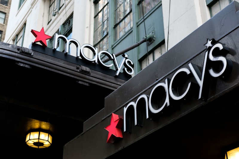 Two Macy's signs above their store during the 2017 Black Friday Sale 