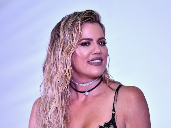 Khloé Kardashian wearing a black top