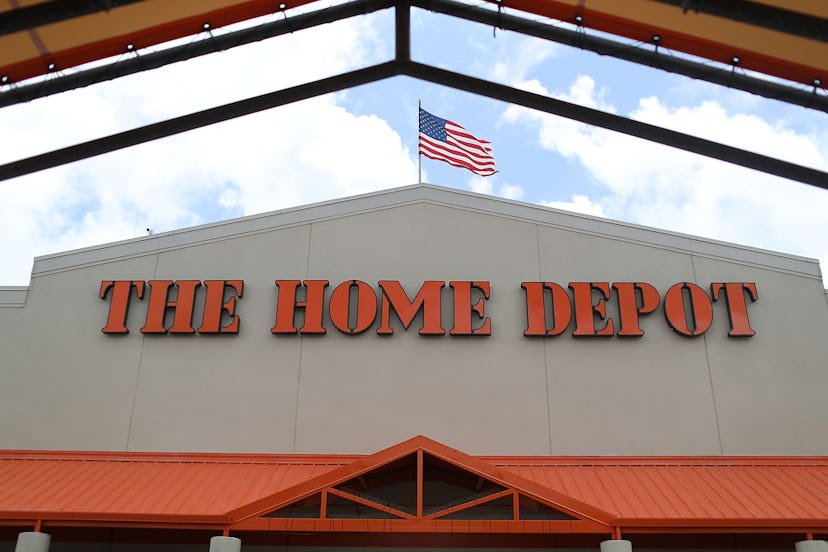 The Home Depot brand store, with the American flag on top of the store.