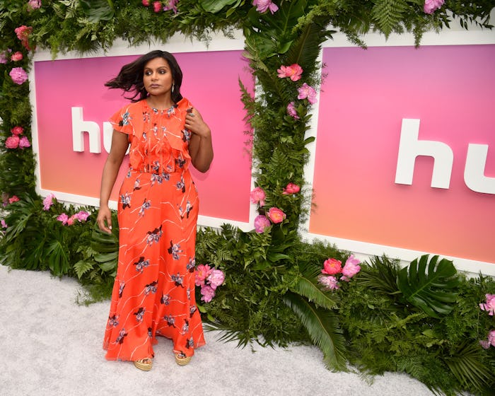 Mindy Kaling in a long patterned dress at a hulu red carpet event