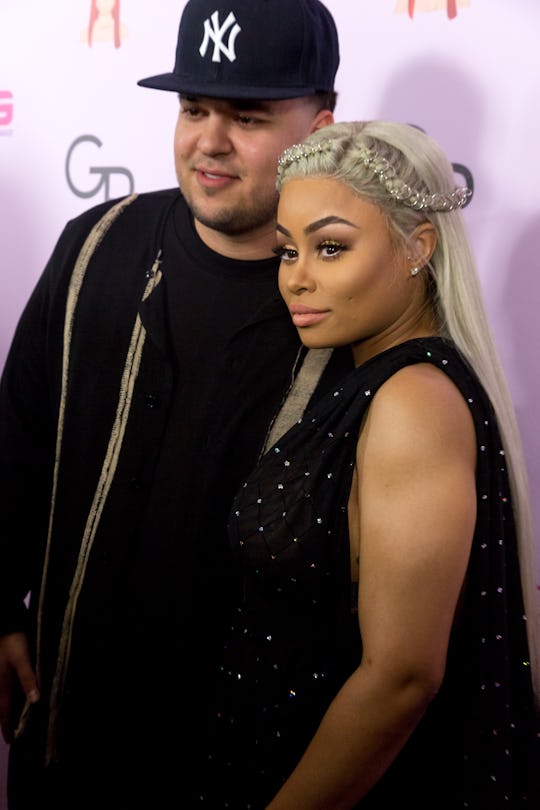 Rob Kardashian and Black Chyna posing at a red carpet event