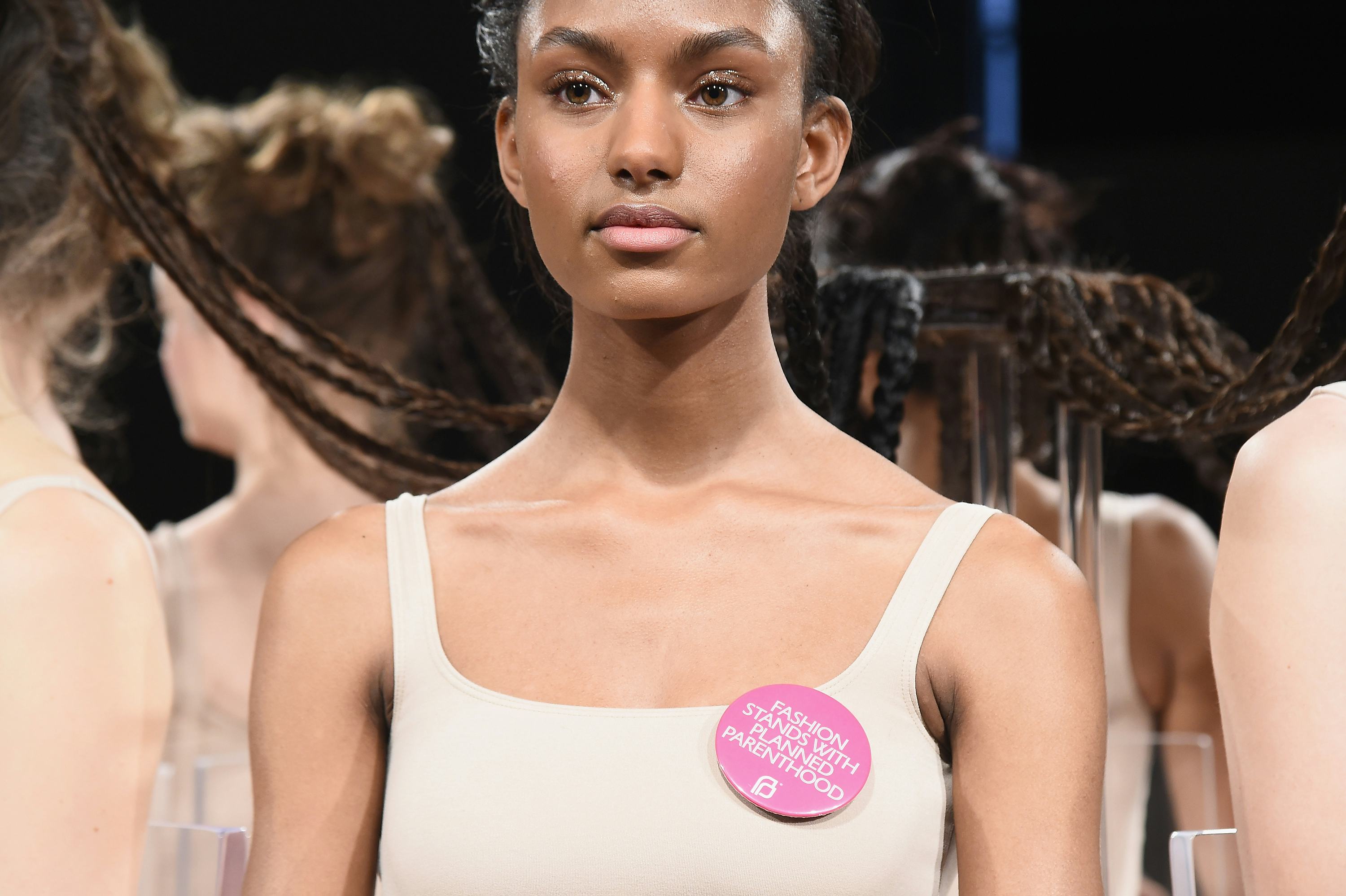 Why Are People Wearing Blue Ribbons At New York Fashion Week? Here’s