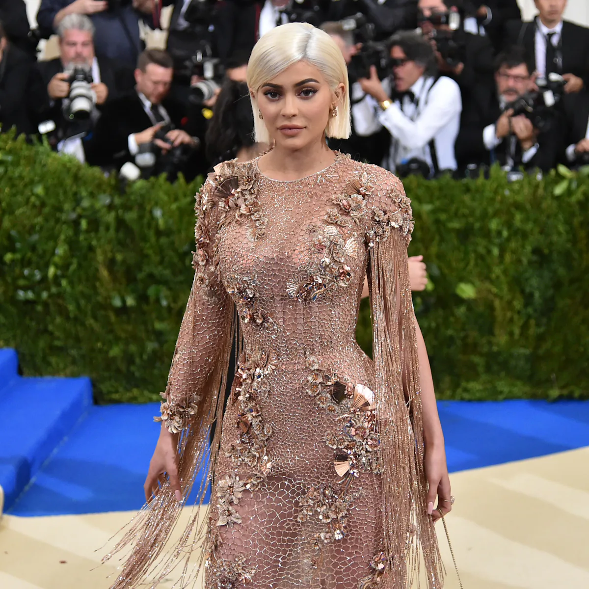 kylie jenner pregnant brown dress Kylie Jenner's Pre-Pregnancy Style Includes Slinky Dresses and Nikes