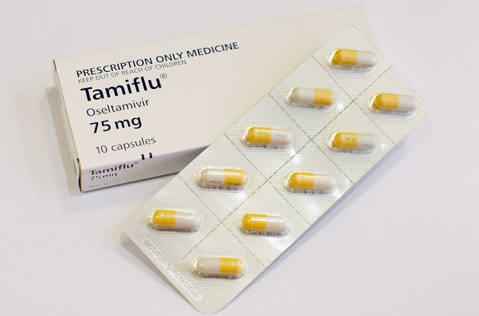 A box of flu medicine on a table