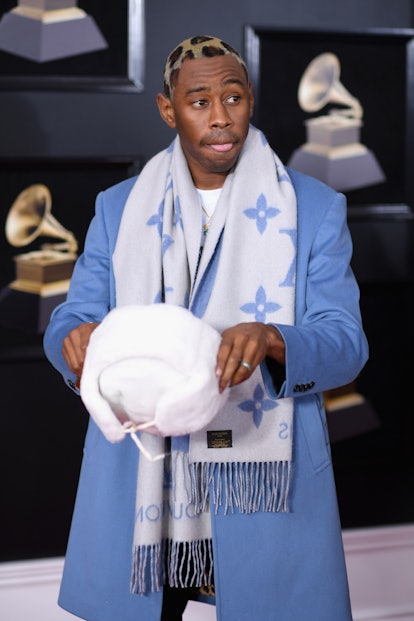 Tyler The Creator Was Hiding Leopard Print Hair Under His Big Fuzzy Hat ...