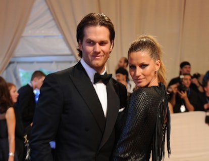 Brady and Bündchen after three years of their relationship back in 2010, dressed in black at a red c...