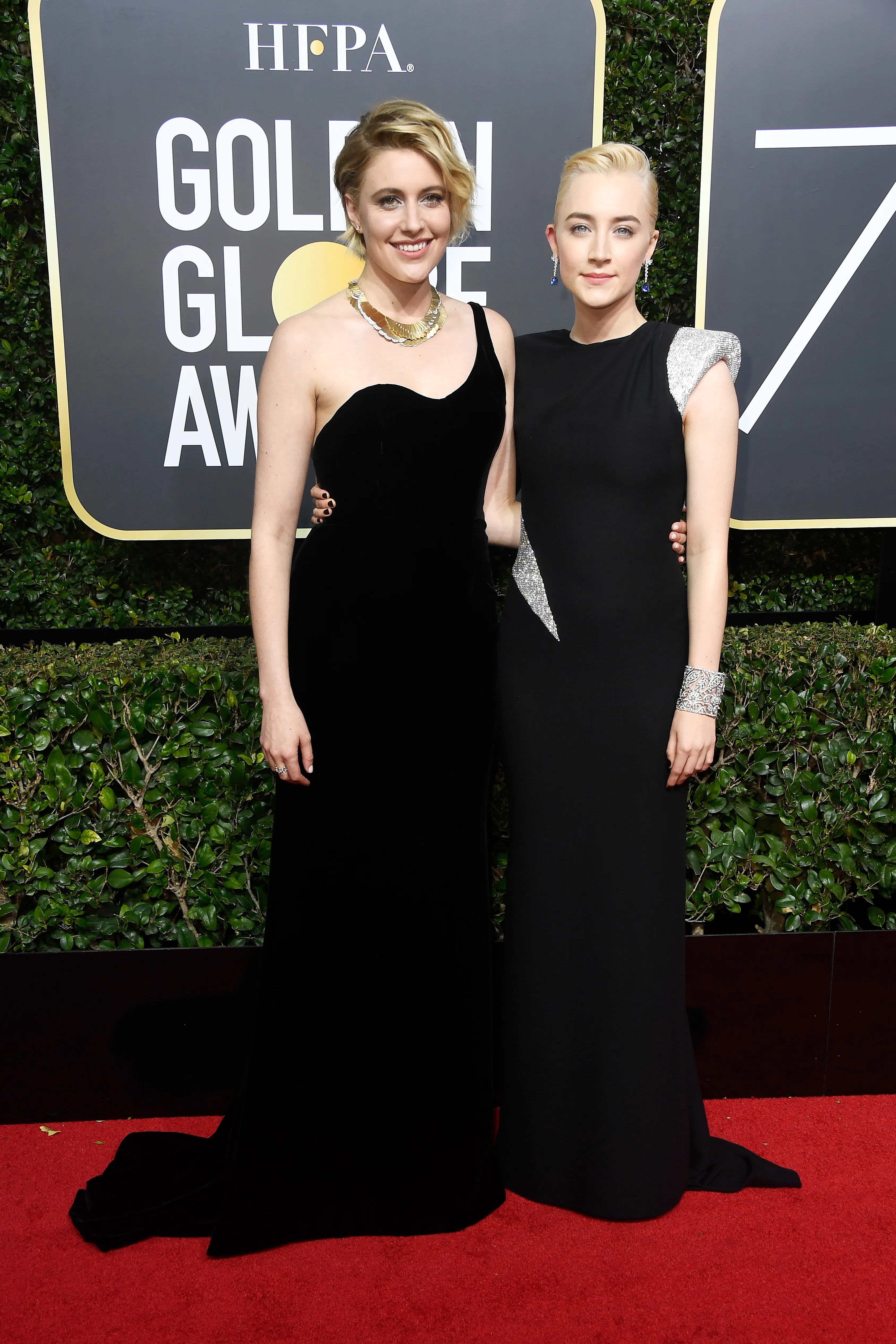 Saoirse Ronan's 2018 Golden Globes Outfit Is A Sleek Black Gown With An Important Statement Saoirse Ronan's 2018 Golden Globes Outfit Is A Sleek Black Gown With An Important Statement