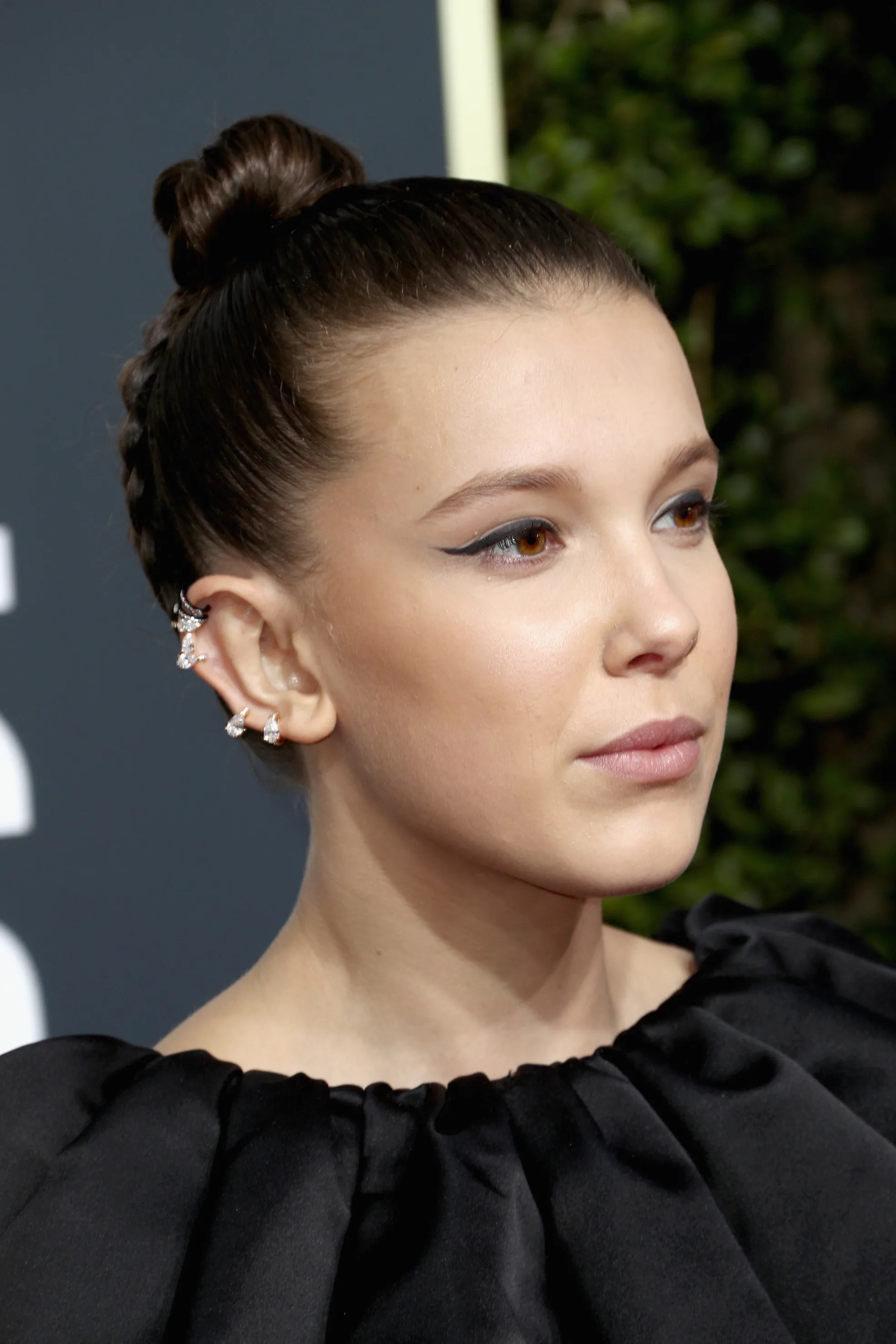 Millie Bobby Brown's 2018 Golden Globes Dress Is One Of Her Boldest Choices Yet Millie Bobby Brown's 2018 Golden Globes Dress Is One Of Her Boldest Choices Yet