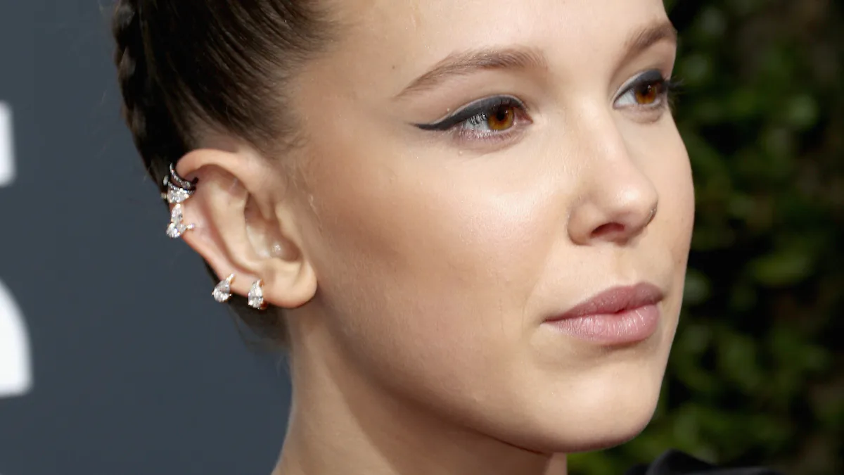 Millie Bobby Brown's 2018 Golden Globes Dress Is One Of Her Boldest Choices Yet Millie Bobby Brown's 2018 Golden Globes Dress Is One Of Her Boldest Choices Yet