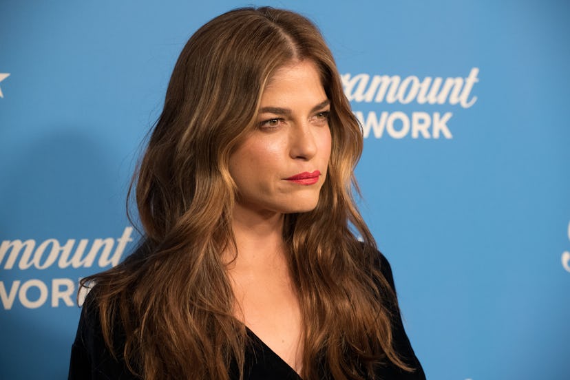 Selma Blair, who lives with multiple sclerosis with brown hair on a red carpet event
