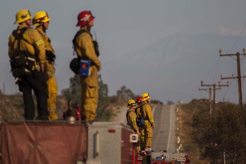 Firefighters arriving at the scene of California wildfires
