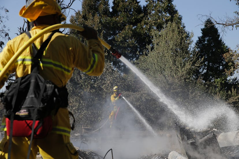Firefighters extinguishing the flame of California wildfires