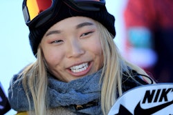 A close-up portrait of Chloe Kim who is taking home the gold
