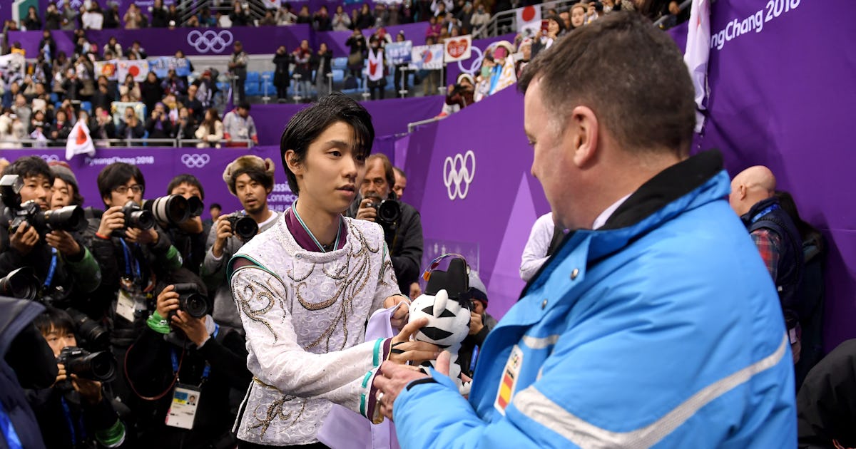 This Photo Of Coach Brian Orser After His Skaters Medaled Turned Into The Sweetest Dad Meme