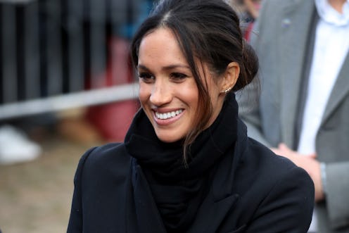 Meghan Markle, the Duchess of Sussex, smiling