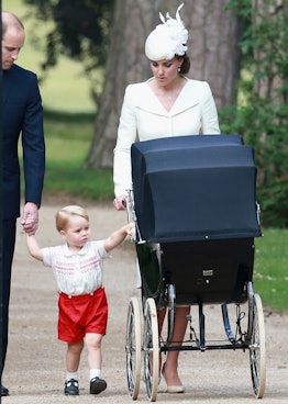 Kate pushing baby stroller and walking with William, holding hands with prince George