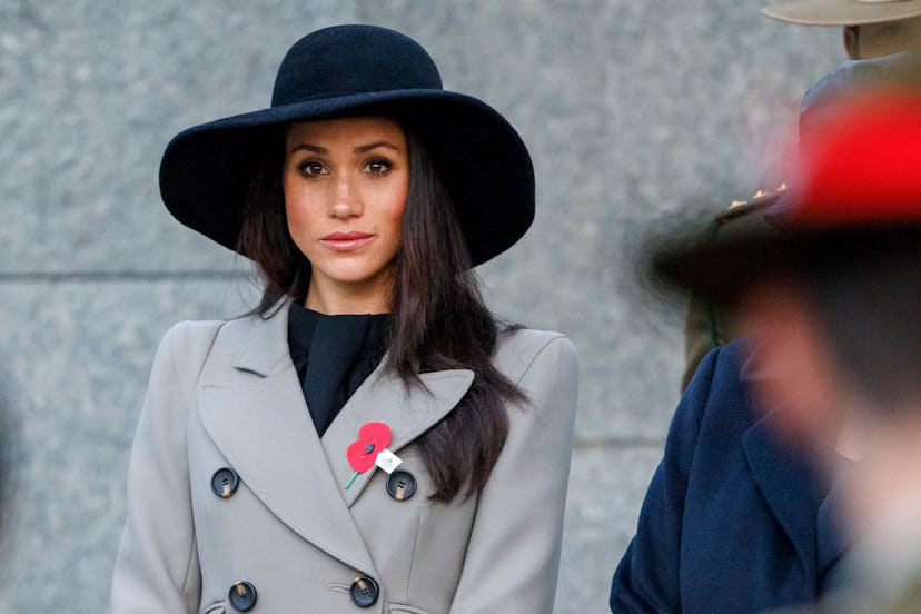 Meghan wearing a grey military-style coat by Smythe for Anzac Day Dawn Service