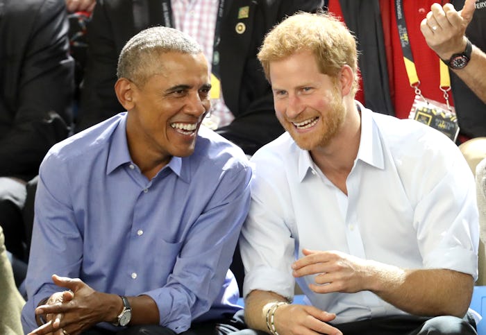 Barack Obama and Prince Harry talking and laughing