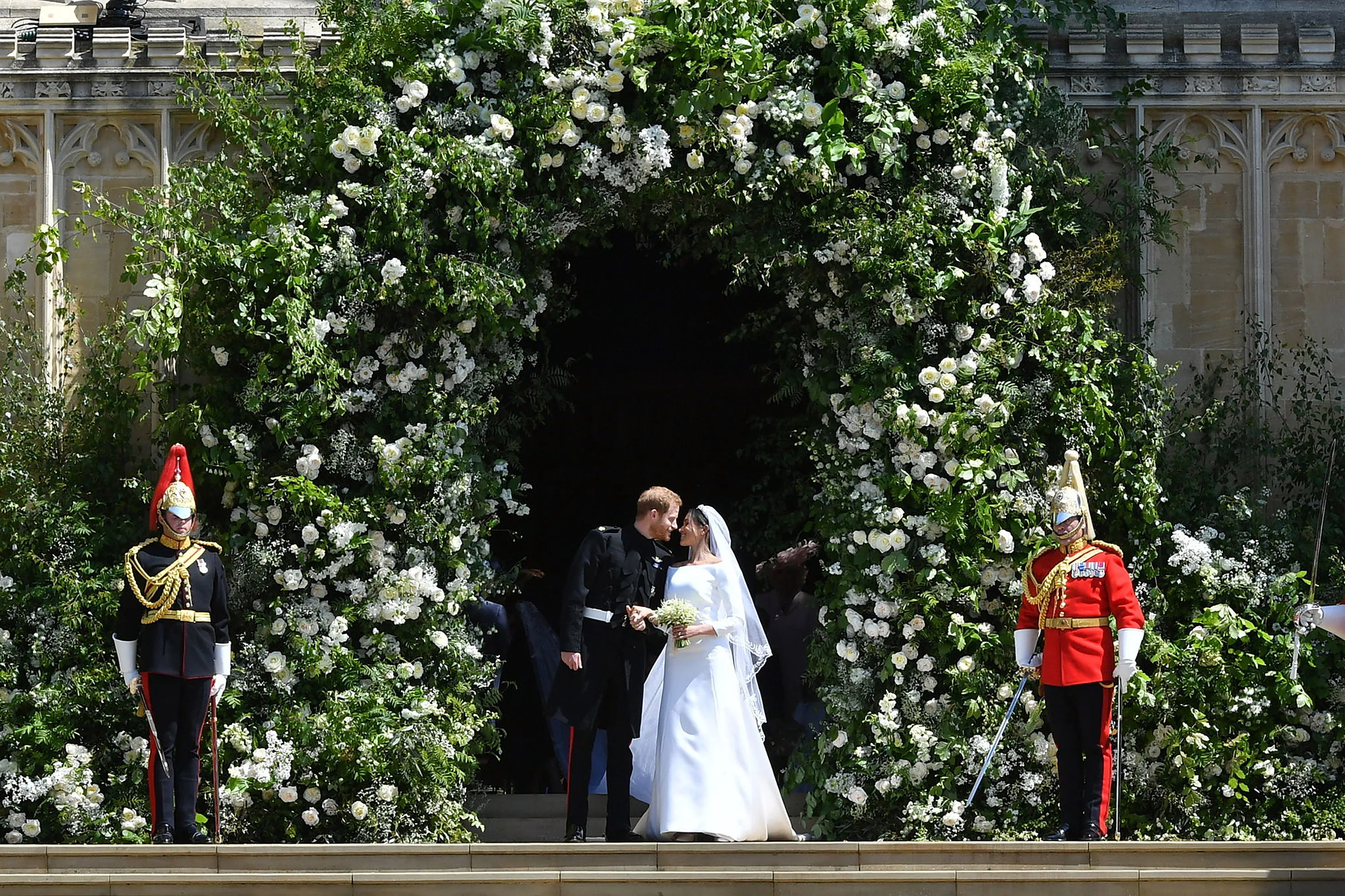 How Much Did Meghan Markle's Wedding Dress Cost? It's A Six-Figure Gown