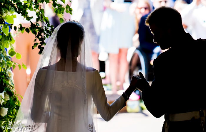 Prince Harry and Meghan Markle walking on their Royal Wedding