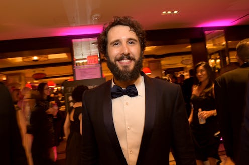 Josh Groban in a tuxedy standing in a crowd at the tony awards