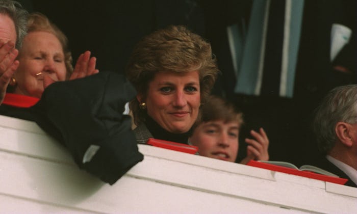 Princess Diana clapping at an event