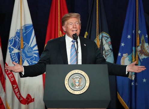 Trump giving his fourth of july message at a podium