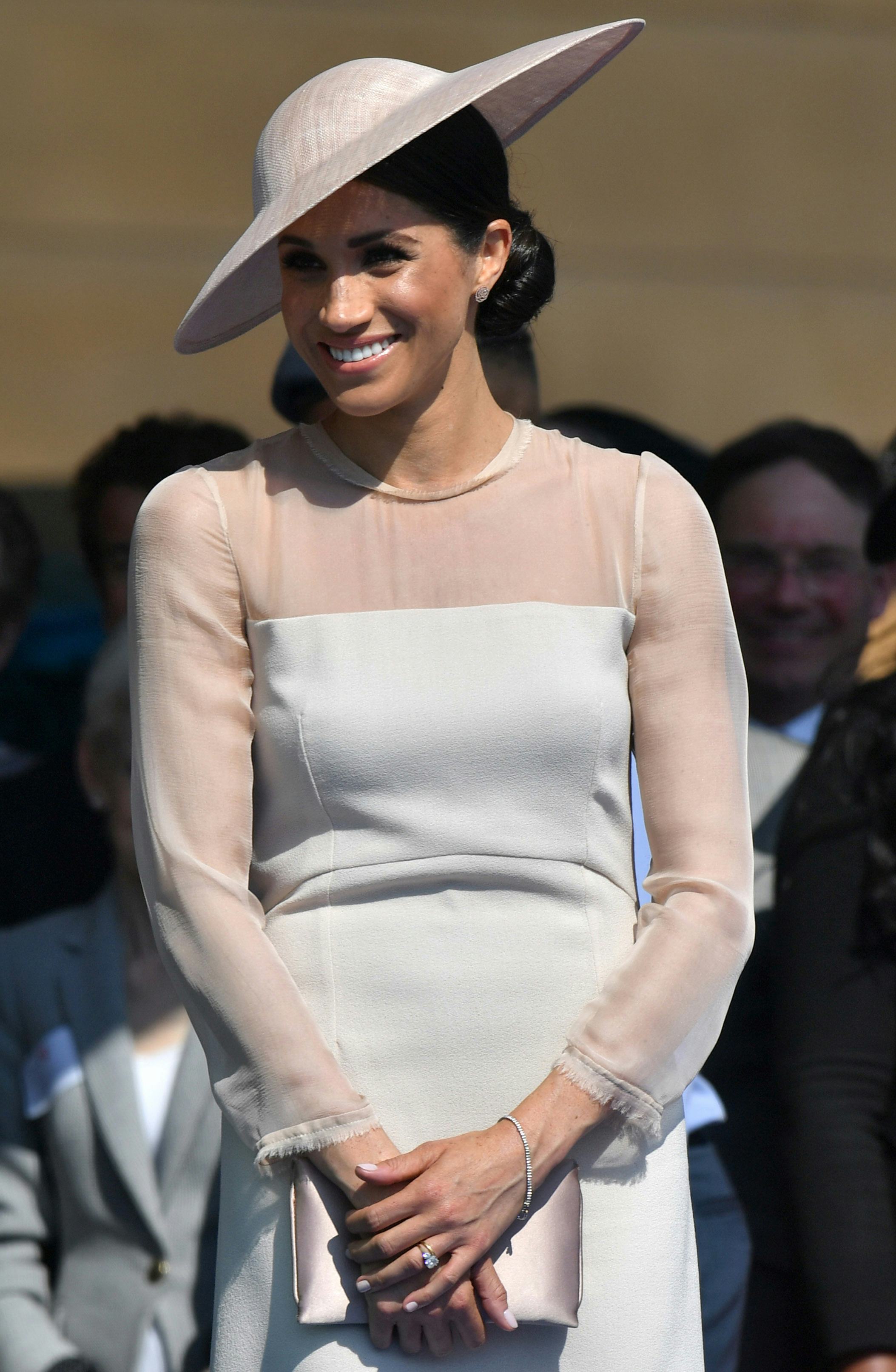 Meghan Markle Is Saving A Cartier Watch For Her Daughter & The(01)