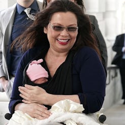 Tammy Duckworth holding her newborn baby