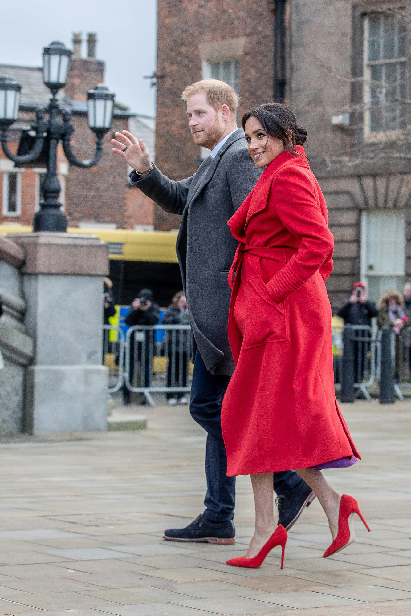 meghan markle purple dress red coat Meghan Markle Wore a Red Coat With a Purple Dress
